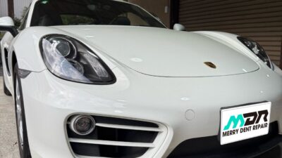 ポルシェ ケイマン リアクウォーターパネルの凹み デントリペア 藤沢市